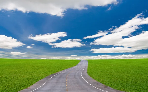 stock image Road under the blue sky