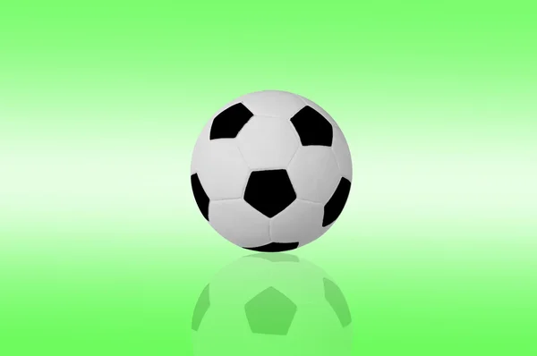 Isolated football on green color background — Stock Photo, Image