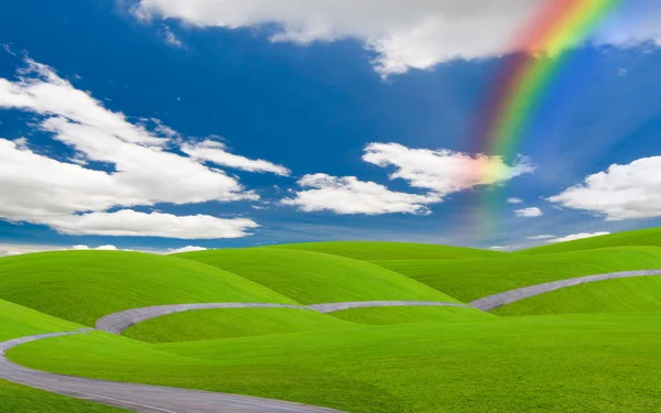 Blue sky and rainbow — Stock Photo, Image