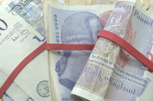 Bundles of twenty pound notes — Stock Photo, Image