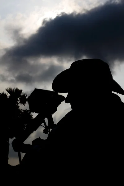 stock image Silhouetted cameraman