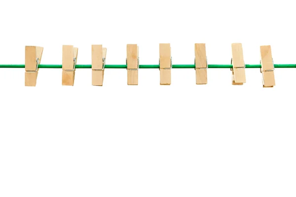 Dřevěný kolíček a zelená lana, samostatný — Stock fotografie
