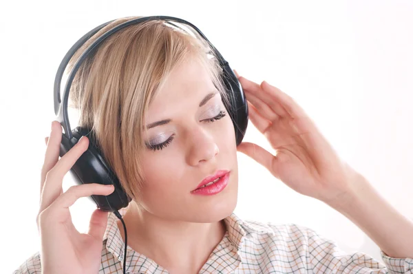 stock image Listens to music