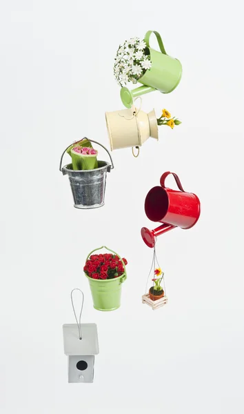 Hanging buckets with beautiful flowers — Stock Photo, Image
