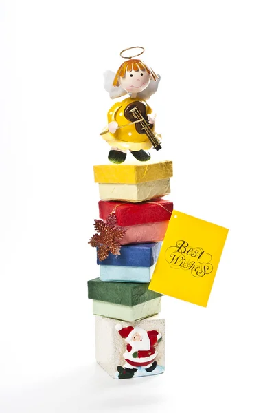 Yellow Angel on top of gift box — Stock Photo, Image