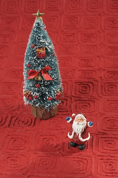Santa and Christmas tree — Stock Photo, Image