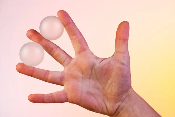 Balls between the fingers — Stock Photo, Image