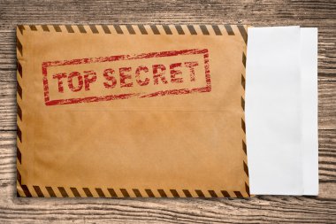 Envelope with top secret stamp and blank papers. clipart