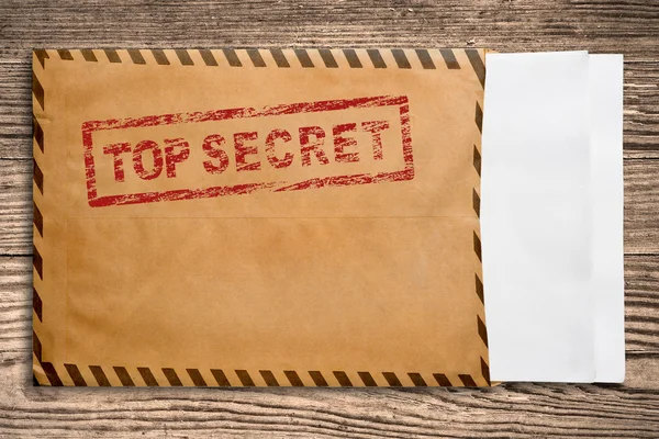 Envelope with top secret stamp and blank papers. — Stock Photo, Image