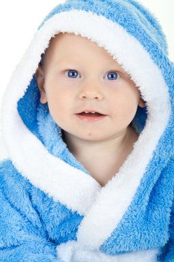 Charming baby in a blue bathrobe clipart