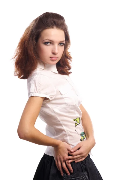 Schönes Mädchen in Bluse posiert isoliert weiß lizenzfreie Stockfotos