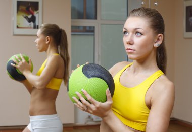 Girl with ball mirror background fitness gym clipart