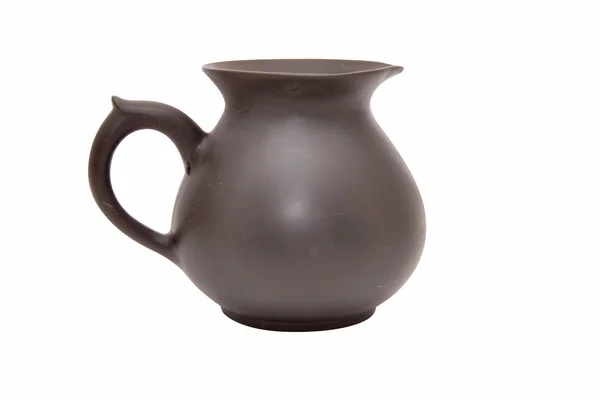 Earthenware jug on a white background — Stock Photo, Image