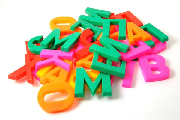 Kolorowy alfabet litery na białym tle — Zdjęcie stockowe