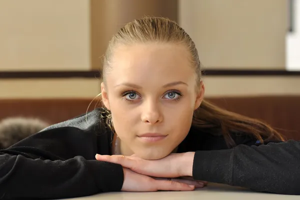 stock image Portrait of a young beautiful girl with blue eyes