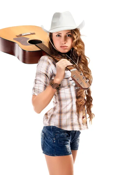 Sesy cowgirl in cappello da cowboy con chitarra acustica — Foto Stock