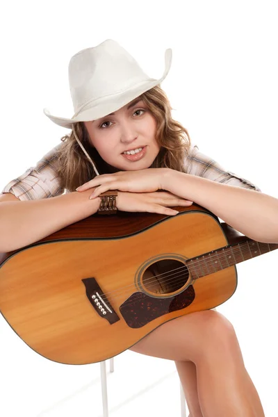 Sesy cowgirl in cowboy hat with acoustic guitar — Stock Photo, Image