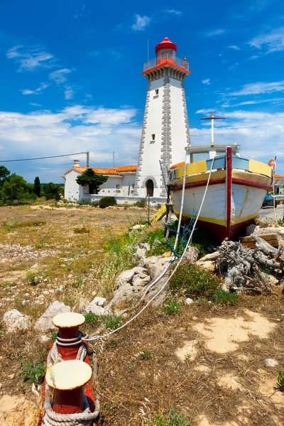 Lighthouse on mediterranean coastline — Stock Photo, Image