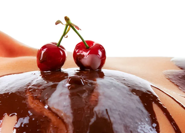Cherry and chocolate on breast — Stock Photo, Image