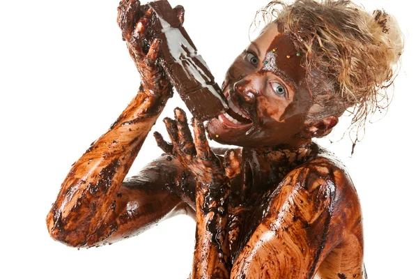 Naked blond girl eating chocolate — Stock Photo, Image