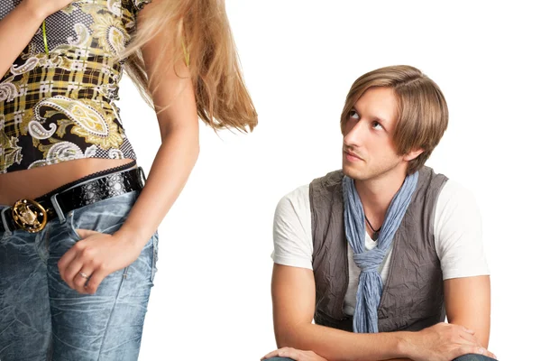 Sittng men looks at woman bottom — Stock Photo, Image