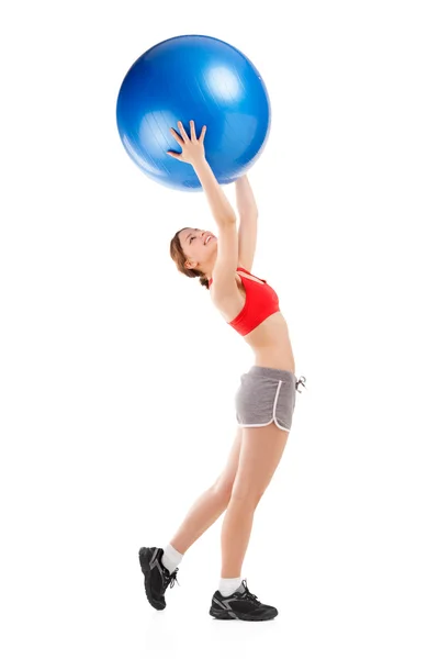 Жінка займається вправами на м'яч — стокове фото