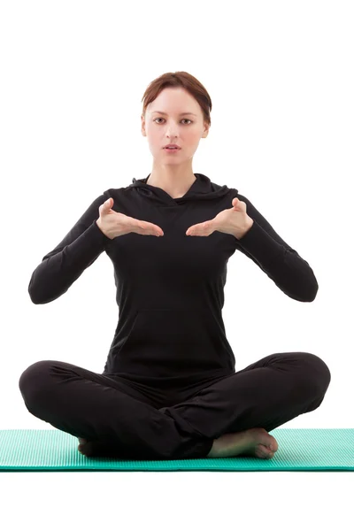 Young woman practicing yoga — Stock Photo, Image
