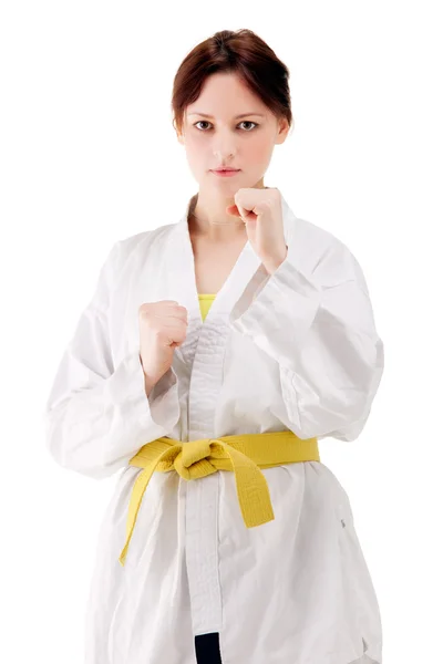 stock image Young sexy women in a karate pose