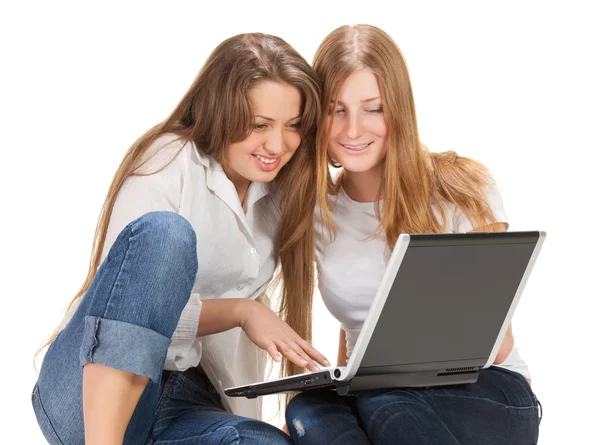 Two young happy student girl work on laptop — Stock Photo, Image