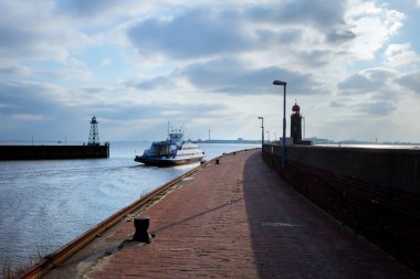 Lighthouse over blue sky in Bremerhaven clipart