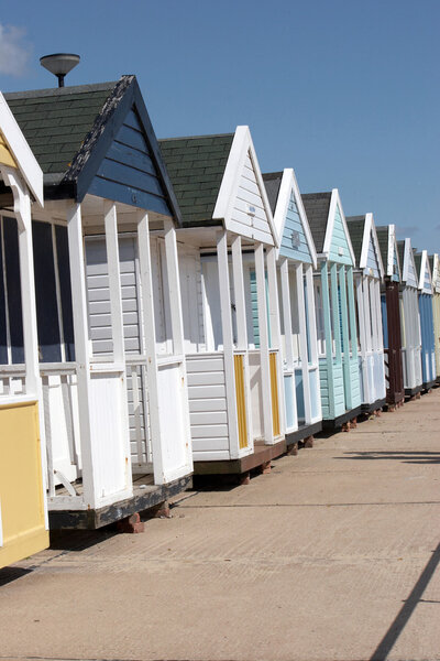 Row of beach huts in a Norfolk seaside town