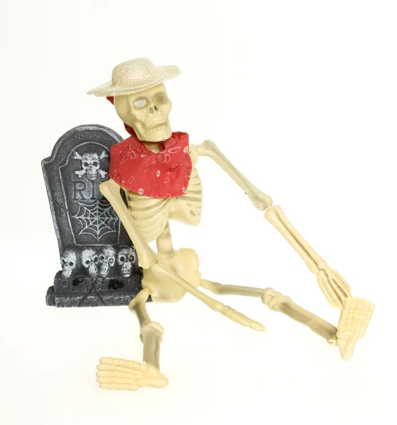 Cowboy skelett i kyrkogård Royaltyfria Stockbilder