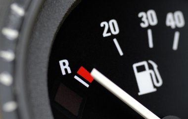 Fuel gauge in a car clipart