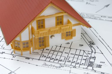 House model on ground plan clipart