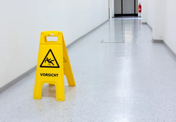 Warning sign slip hazard — Stock Photo, Image