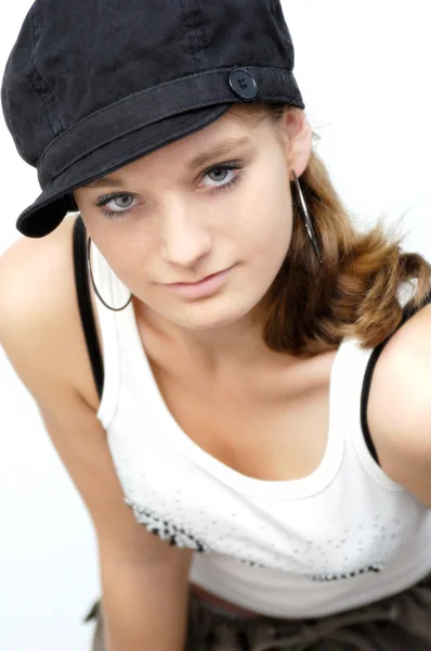 Young woman with black cap — Stock Photo, Image