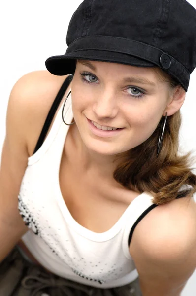 Young woman with black cap — Stock Photo, Image