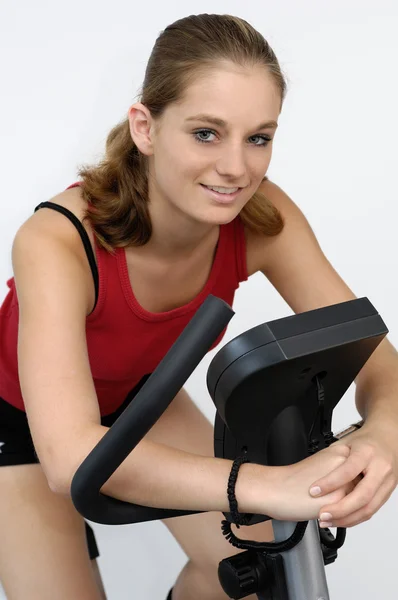 stock image Young sporty on a training bike