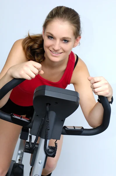 stock image Young sporty on a training bike