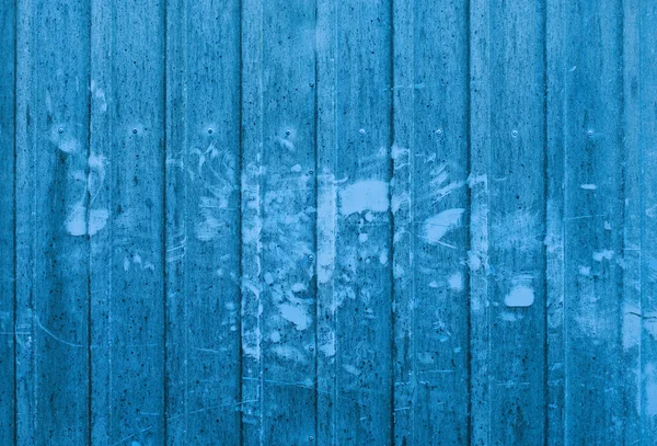 Blaue Containerwand mit zahlreichen Flecken — Stockfoto