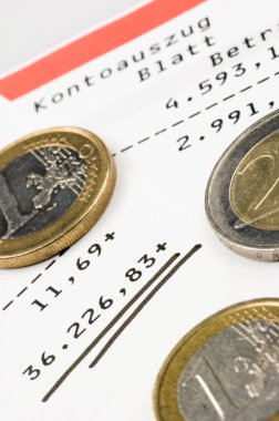 Euro coins on a bank account clipart