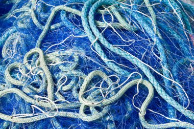 Disordered blue fishing nets clipart