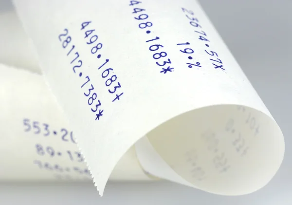Tiras de papel de uma máquina de calcular — Fotografia de Stock