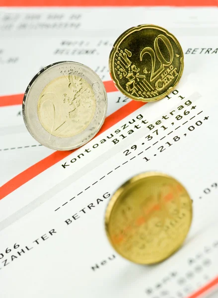 Euro coin on a bank account — Stock Photo, Image