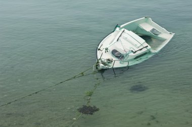 Shipwreck on a sandbank clipart