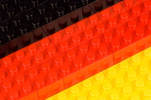 Building blocks in the colours of the german national flag — Stock Photo, Image