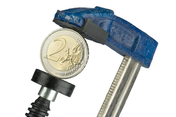 Euro coin in a blue clamp — Stock Photo, Image