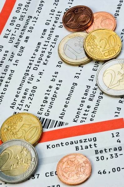 Monedas en euros en una cuenta bancaria —  Fotos de Stock