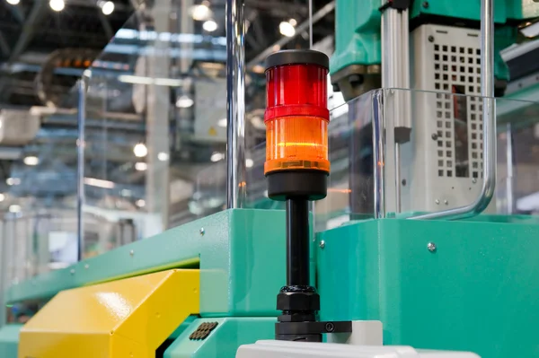Warning light on a processing machine — Stock Photo, Image