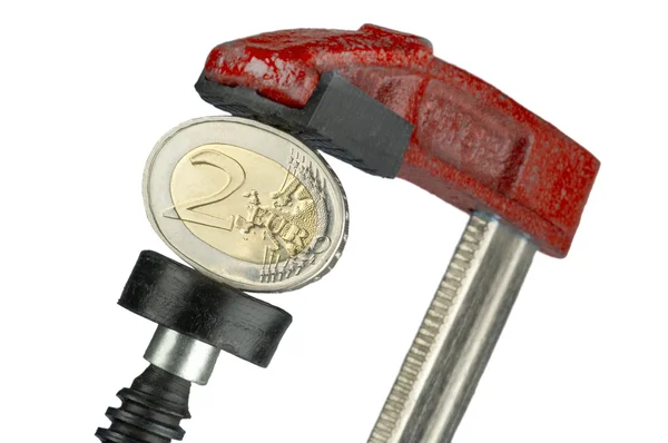 Two-euro-coin in red clamp — Stock Photo, Image
